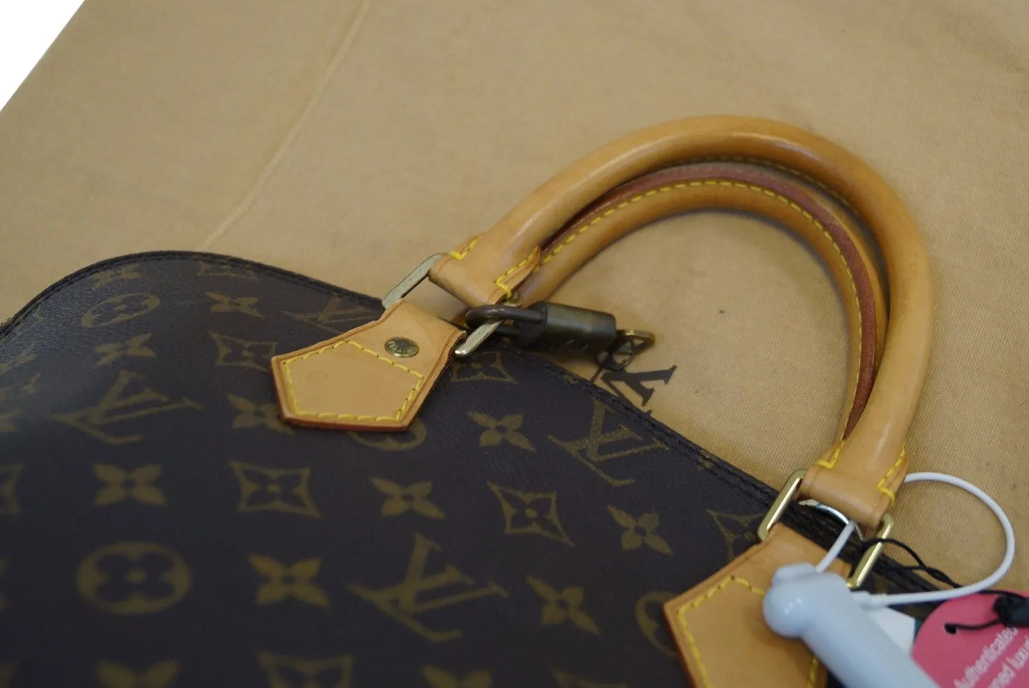 LOUIS VUITTON Monogram Canvas Alma Brown Satchel Handbag