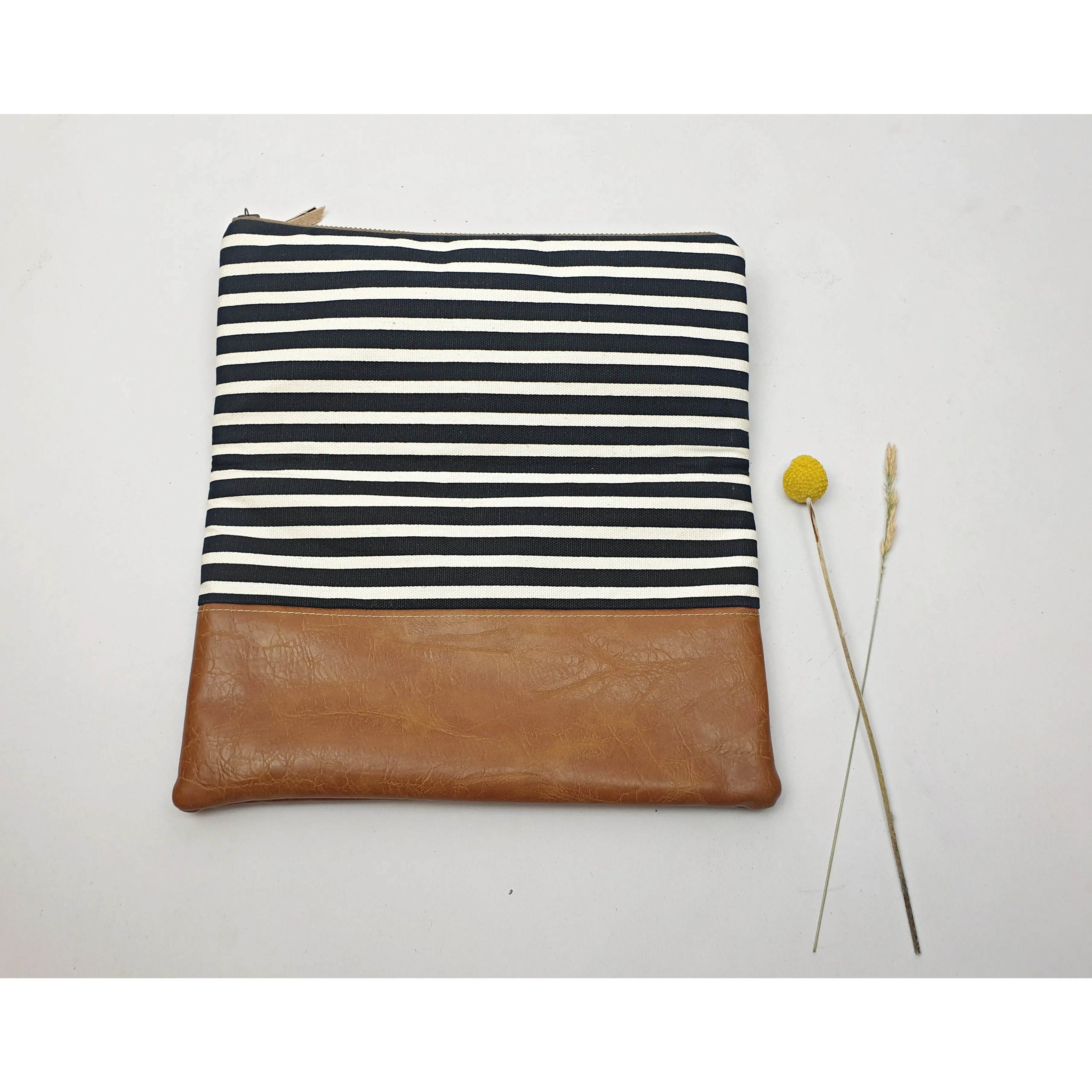 Maddie Kay brown faux leather foldover clutch with navy and white striped fabric