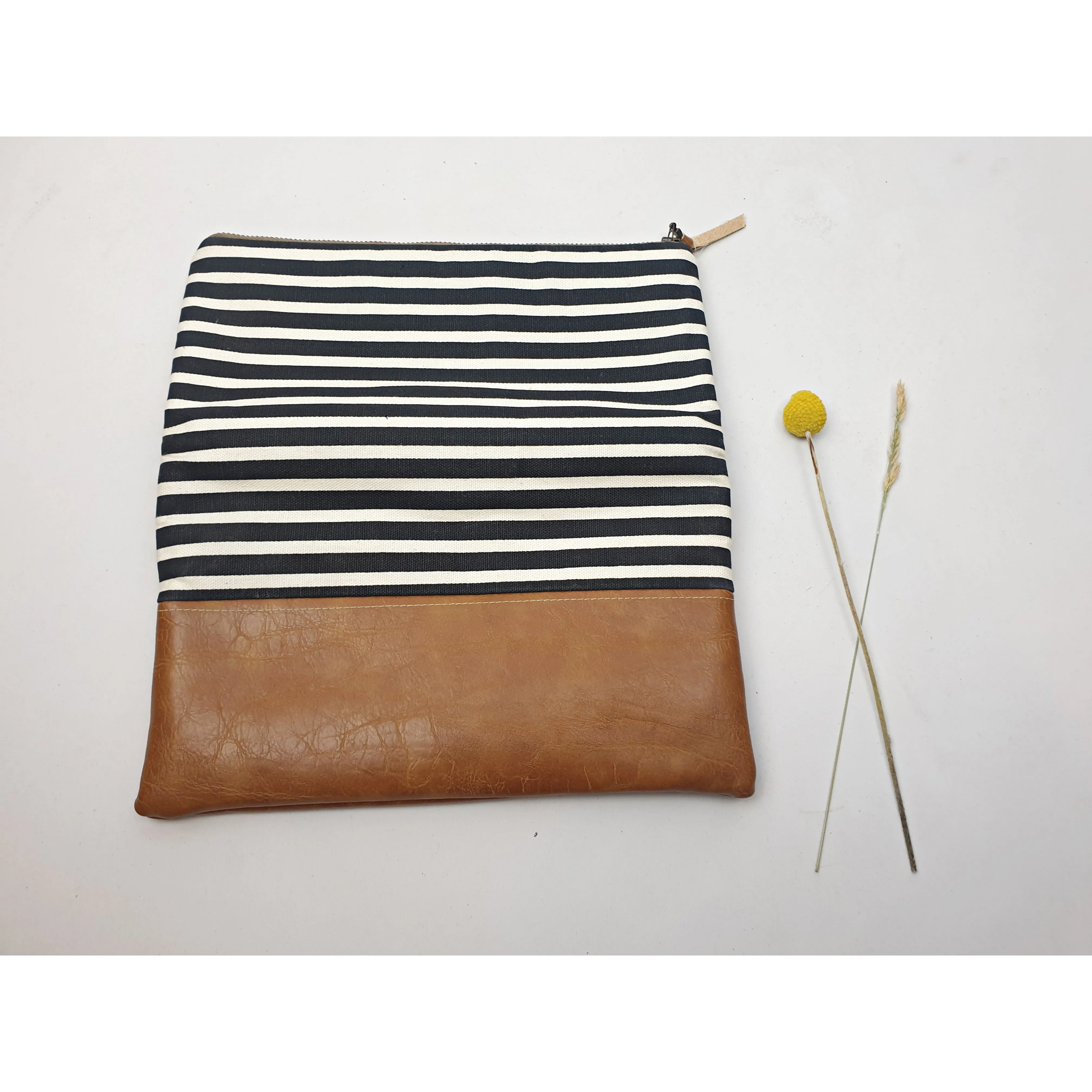 Maddie Kay brown faux leather foldover clutch with navy and white striped fabric