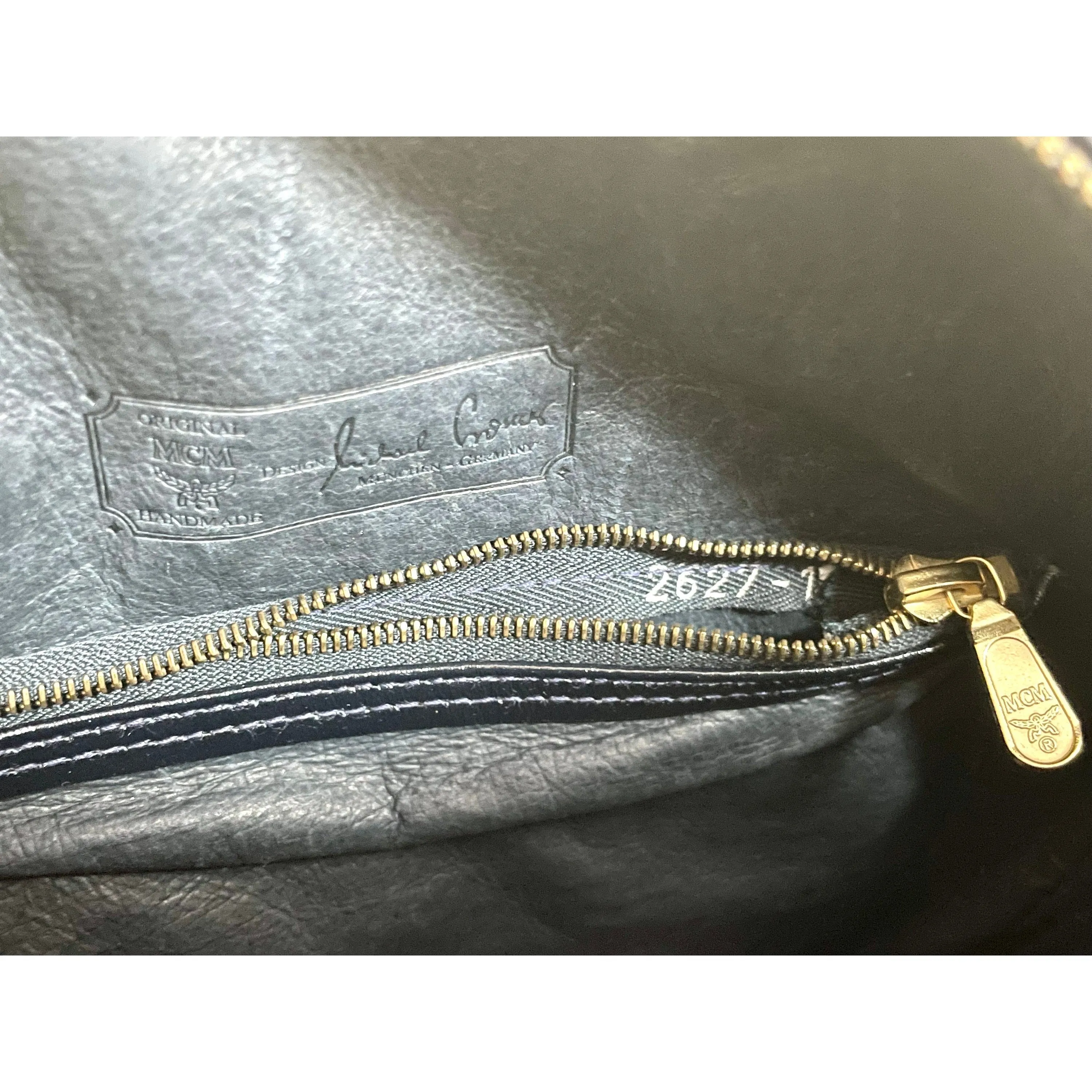 MINT. Vintage MCM navy and white monogram round shape Suzy Wong shoulder bag with leather trimmings. Designed by Michael Cromer. 060309ya