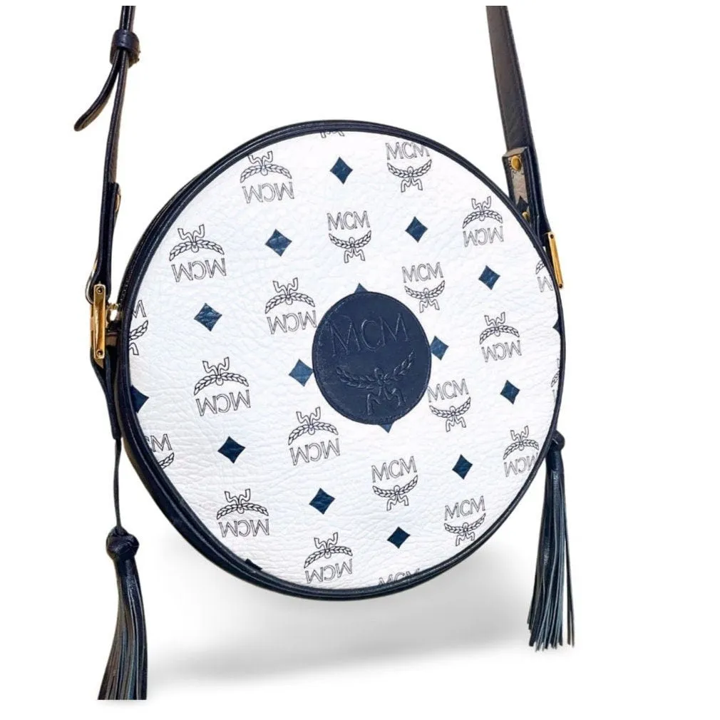 MINT. Vintage MCM navy and white monogram round shape Suzy Wong shoulder bag with leather trimmings. Designed by Michael Cromer. 060309ya