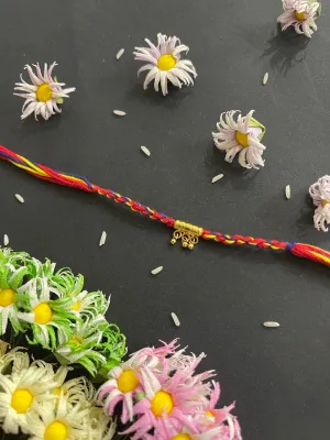 Simple Colorful Rakhi Criss Cross Thread Rakhi With Ghungroo For Raksha Bandhan