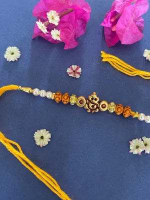 Simple Ganesha God Pearl Rakhi With Beads Orange Thread Rakhi Raksha Bandhan