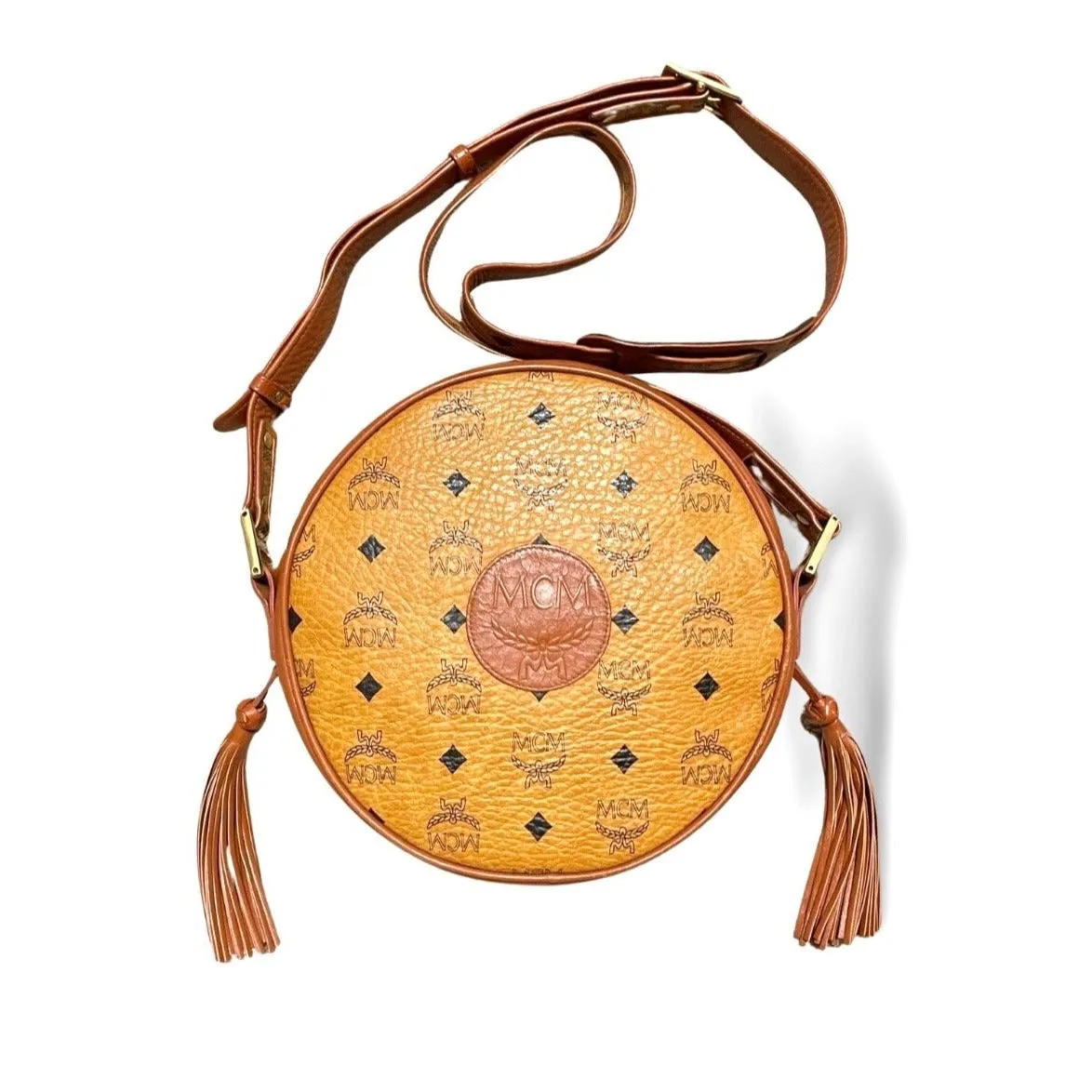 Vintage MCM brown monogram round shape Suzy Wong shoulder bag with leather trimmings. Designed by Michael Cromer. 06521ac2